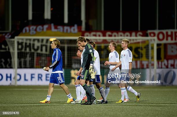 Faeroe Islands players give a thanks to their fans after the FIFA 2014 World Cup Qualifier match between Faeroe Islands and Germany on September 10,...