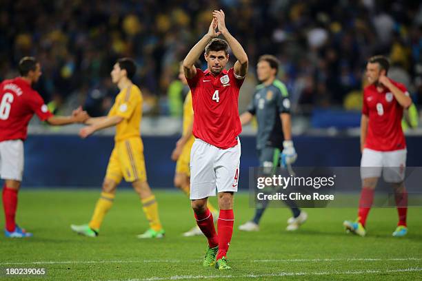 Steven Gerrard of England applauds the travelling fans following the 0-0 draw during the FIFA 2014 World Cup Qualifying Group H match between Ukraine...