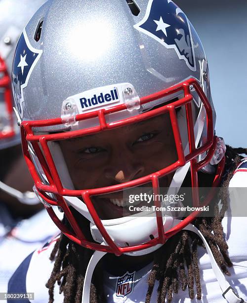 Marquice Cole of the New England Patriots warms up before playing in an NFL game against the Buffalo Bills at Ralph Wilson Stadium on September 8,...