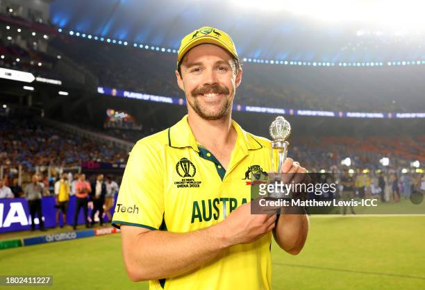 Travis Head of Australia poses after being named Player of the Match following the ICC Men's Cricket World Cup India 2023 Final between India and...