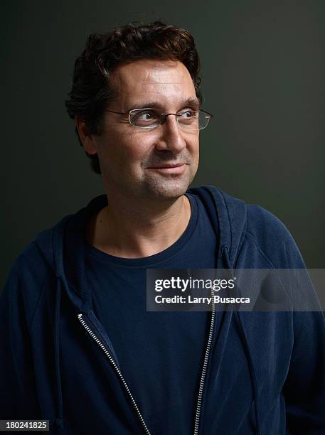 Director Thanos Anastopoulos of 'The Daughter' from 'City To City' poses at the Guess Portrait Studio during 2013 Toronto International Film Festival...
