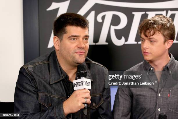 Director Nimrod Antal and actor Dane DeHaan attend the Variety Studio presented by Moroccanoil at Holt Renfrew during the 2013 Toronto International...