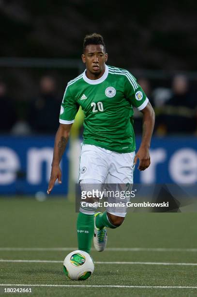 Jerome Boateng of Germany controls the ball during the FIFA 2014 World Cup Qualifier match between Faeroe Islands and Germany on September 10, 2013...