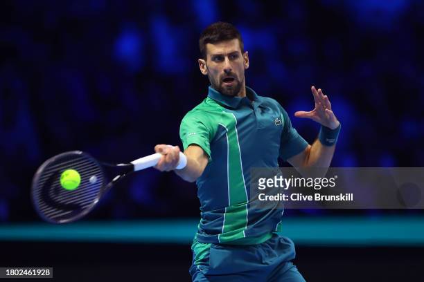 Novak Djokovic of Serbia plays a forehand during the Men's Singles Finals against Jannik Sinner of Italy on day eight of the Nitto ATP Finals at Pala...