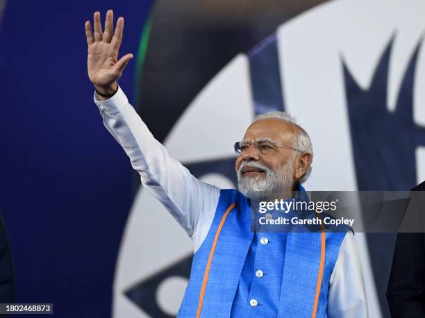 Narendra Modi, Prime Minister for India waves to the crowd at the presentations of the ICC Men's Cricket World Cup India 2023 Final between India and...