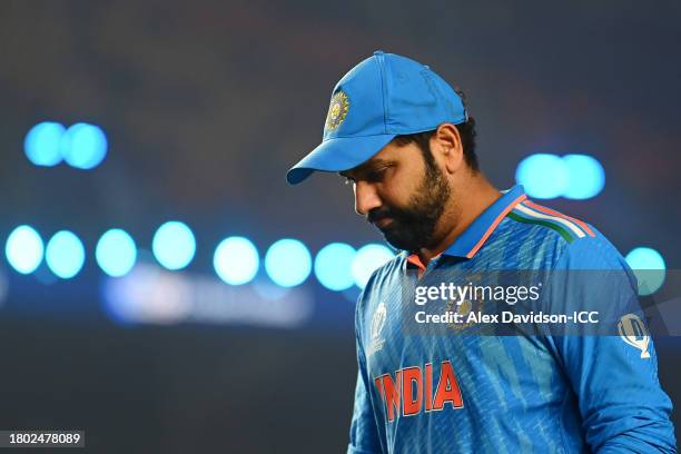 Rohit Sharma of India cuts a dejected figures following the ICC Men's Cricket World Cup India 2023 Final between India and Australia at Narendra Modi...