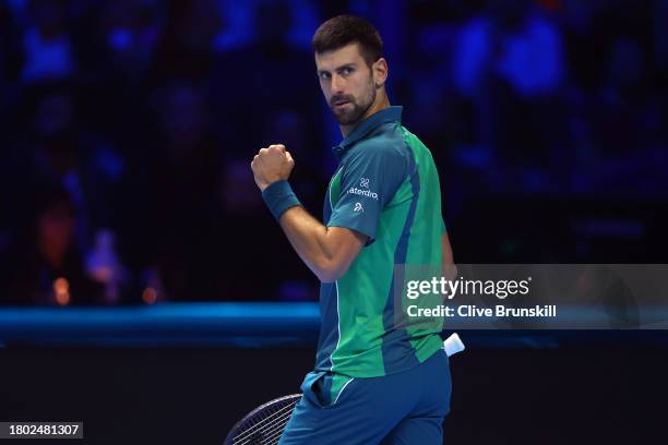 Novak Djokovic of Serbia celebrates to Jannik Sinner of Italy during the Men's Singles Finals between Jannik Sinner of Italy and Novak Djokovic of...