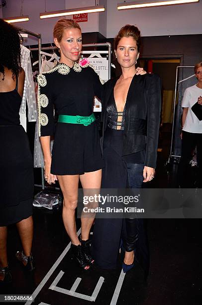 Designers Heidi Middleton and Sarah Jane Clarke attend the Sass & Bide show during Spring 2014 Mercedes-Benz Fashion Week at Classic Car Club on...