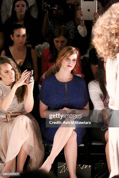Louise Roe and actress Christina Hendricks attend TRESemme at the Jenny Packham fashion show during Mercedes-Benz Fashion Week Spring 2014 at The...