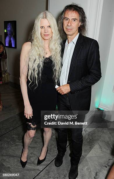 Kristen McMenamy and Ivor Braka attend a private view of 'Portraits', a new exhibition by Jonathan Yeo, at the National Portrait Gallery on September...