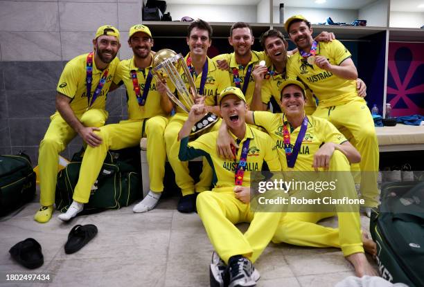 Sean Abbott, Adam Zampa, Pat Cummins, Travis Head, Glenn Maxwell, Mitchell Starc, Josh Hazlewood and Mitch Marsh of Australia pose with the ICC Men's...