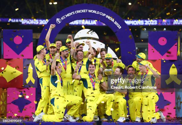 Pat Cummins of Australia lifts the ICC Men's Cricket World Cup Trophy following the ICC Men's Cricket World Cup India 2023 Final between India and...