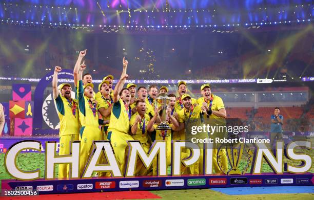 Pat Cummins of Australia lifts the ICC Men's Cricket World Cup Trophy following the ICC Men's Cricket World Cup India 2023 Final between India and...