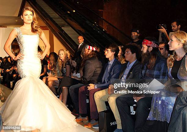 The Robertson family of "Duck Dynasty" attend an Evening By Sherri Hill fashion show during Mercedes-Benz Fashion Week Spring 2014 at Trump Tower on...