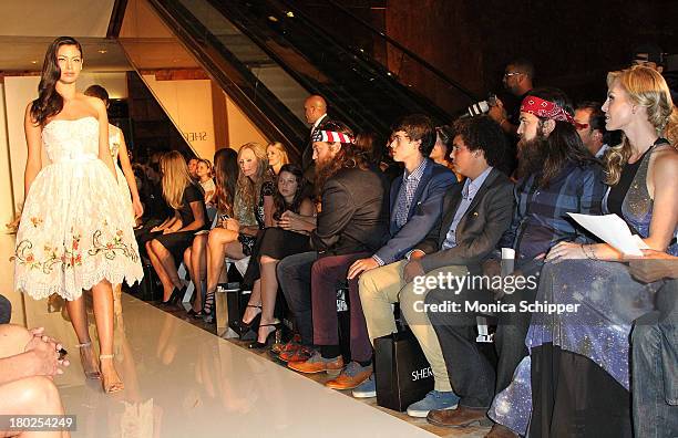 The Robertson family of "Duck Dynasty" attend an Evening By Sherri Hill fashion show during Mercedes-Benz Fashion Week Spring 2014 at Trump Tower on...