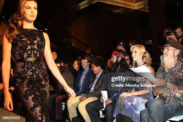 The Robertson family of "Duck Dynasty" attend an Evening By Sherri Hill fashion show during Mercedes-Benz Fashion Week Spring 2014 at Trump Tower on...