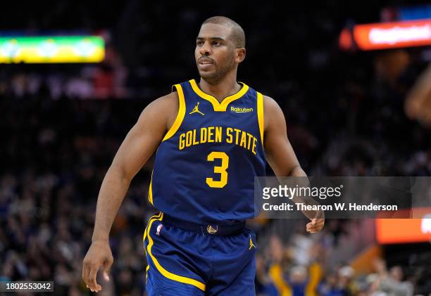 Chris Paul of the Golden State Warriors looks on against the Oklahoma City Thunder during overtime of an NBA basketball game at Chase Center on...