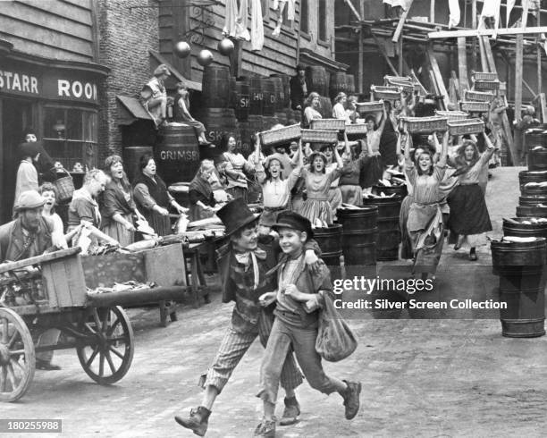 English child actors Jack Wild as the Artful Dodger, and Mark Lester as Oliver Twist in 'Oliver!', directed by Carol Reed, 1968.