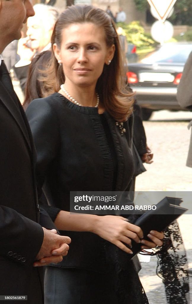 Syrian President Bashar Al-Assad And His Wife Asma Attend The Funeral