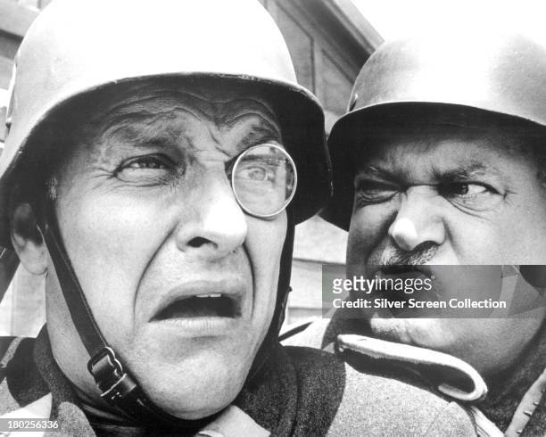 Werner Klemperer , as Colonel Klink, and John Banner as Sergeant Schultz in the American TV comedy series 'Hogan's Heroes', circa 1968.