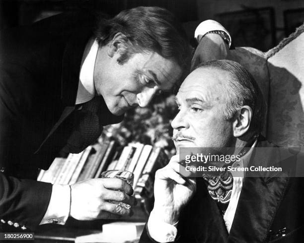 English actors Michael Caine as Milo Tindle, and Laurence Olivier as Andrew Wyke, in 'Sleuth', directed by Joseph L. Mankiewicz, 1972.