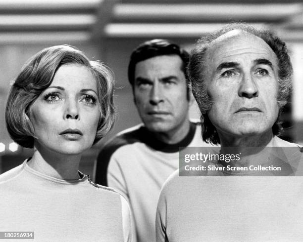 Barbara Bain as Doctor Helena Russell, Martin Landau as Commander John Koenig, and Barry Morse as Professor Victor Bergman in the British TV science...