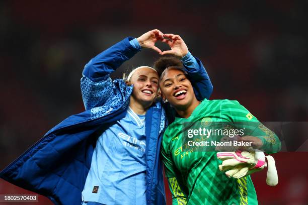 Chloe Kelly and Khiara Keating of Manchester City acknowledge the fans following the team's victory during the Barclays Women´s Super League match...