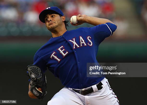 Texas Rangers starting pitcher Martin Perez pitches against the Pittsburgh Pirates in the top of the first inning at Rangers Ballpark in Arlington on...