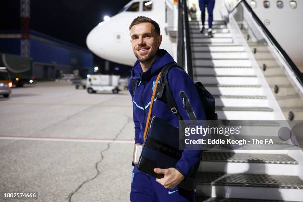 Jordan Henderson of England reacts as the England Team arrive at Skopje International Airport on November 19, 2023 in Skopje, Macedonia.