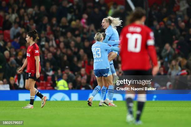 Alex Greenwood, Steph Houghton and Alanna Kennedy of Manchester City celebrate following the team's victory during the Barclays Women´s Super League...