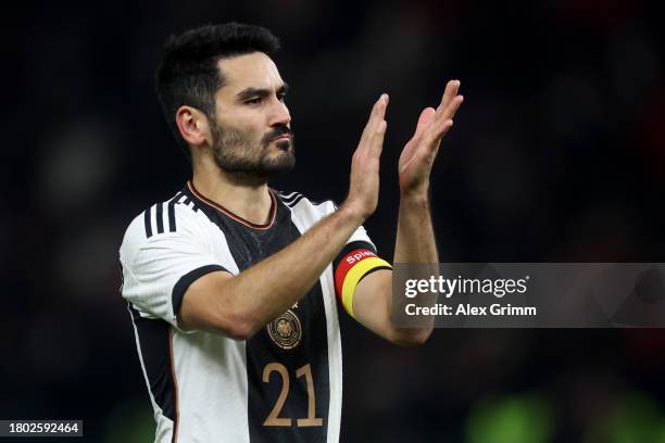 Ilkay Guendogan of Germany acknowledges the fans after an international friendly match between Germany and Turkey at Olympiastadion on November 18,...