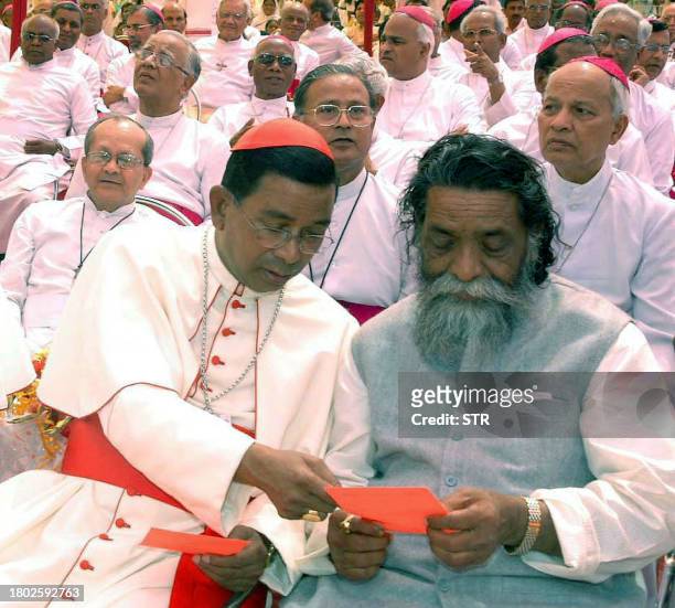 Chief Minister of the Indian state of Jharkand Shibu Soren talks with Cardinal Telesphore Placidus Toppo at a Conference of Catholic Bishops of India...