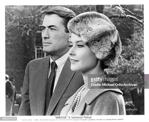 Actor Gregory Peck and actress Diane Baker on the set of the Universal Studio movie " Mirage" in 1958.