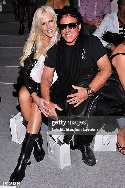 Michaele Salahi and musician Neal Schon attend the Zang Toi fashion show during Mercedes-Benz Fashion Week Spring 2014 at The Stage at Lincoln Center...