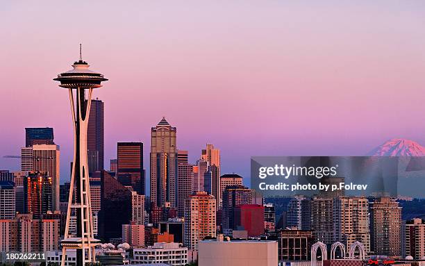 seattle and mt rainier after sunset - seattle skyline stock pictures, royalty-free photos & images