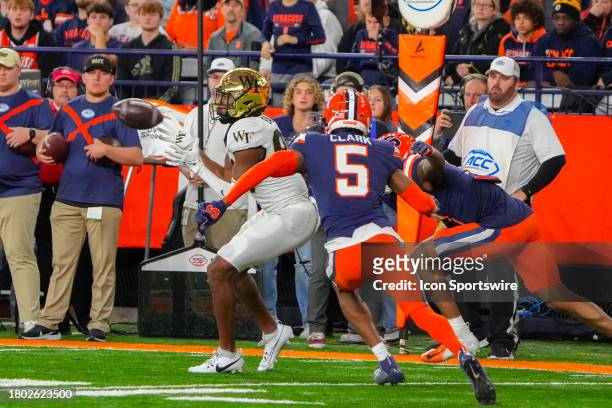 Wake Forest Demon Deacons Wide Receiver Jahmal Banks makes a catch against Syracuse Orange Defensive Back Alijah Clark during the second half of the...