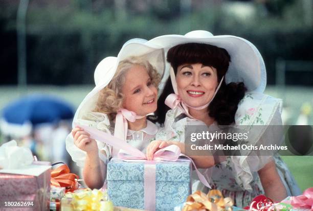 Actress Faye Dunaway and Mara Hobel on the set of Paramount Pictures movie " Mommie Dearest" in 1981.