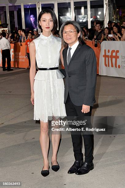 Actress Du Juan and director/producer Peter Ho-sun Chan arrive at the "American Dreams" Premiere during the 2013 Toronto International Film Festival...