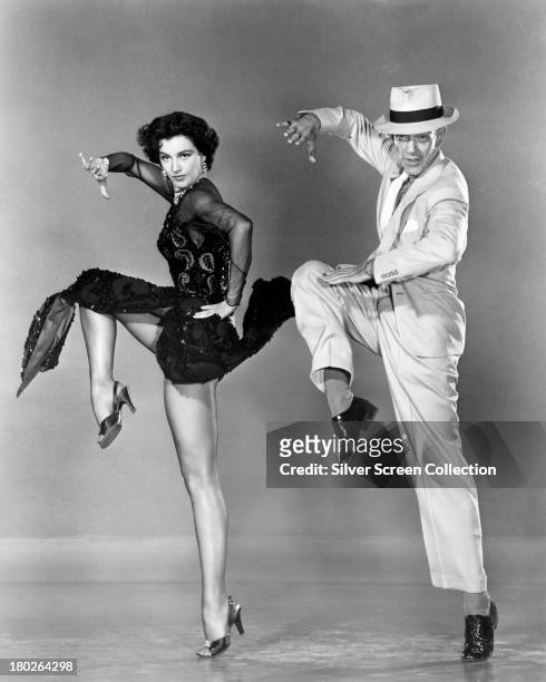 Fred Astaire and Cyd Charisse dancing in a publicity still for 'The Band Wagon', directed by Vincente Minnelli, 1953.
