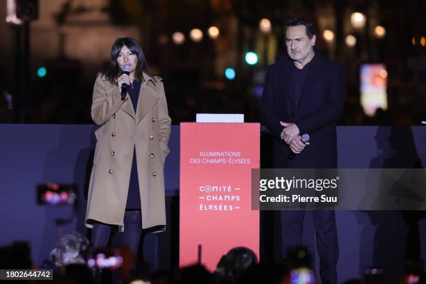 Anne Hidalgo and Gilles Lellouche attend the Christmas lights launch at the Champs-Élysées on November 19, 2023 in Paris, France.