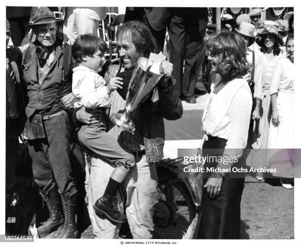 Actors David Carradine with Whit Clay and actress Brenda Vaccaro on set of the Universal Studios movie " Fast Charlie... The Moonbeam Rider" in 1979.