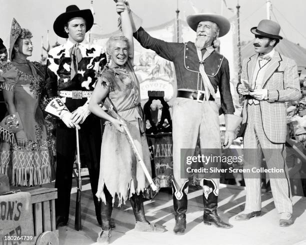 Benay Venuta as Dolly Tate, Howard Keel as Frank Butler, Betty Hutton as Annie Oakley, Louis Calhern as Buffalo Bill Cody and Keenan Wynn as Charlie...