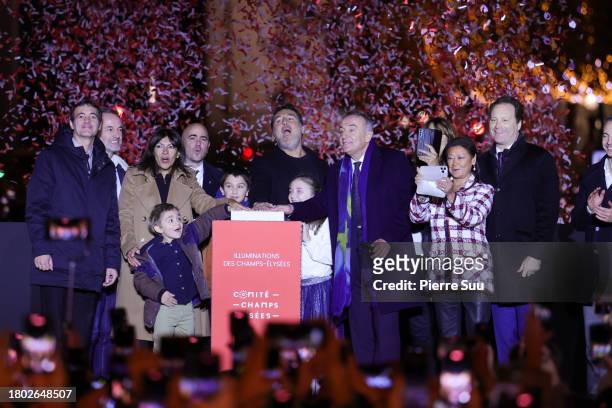 Anne Hidalgo , Gilles Lellouche and members of the Champs-Élysées committee attend the Christmas lights launch at the Champs-Élysées on November 19,...