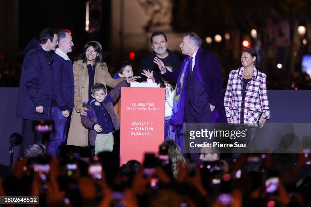 Anne Hidalgo , Gilles Lellouche and members of the Champs-Élysées committee attend the Christmas lights launch at the Champs-Élysées on November 19,...