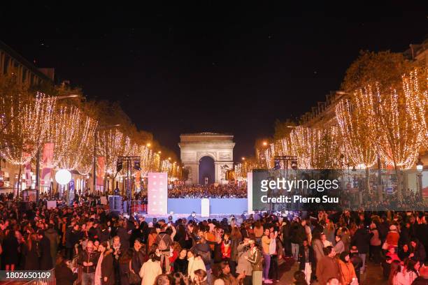 View of atmosphere at the Christmas lights launch at the Champs-Élysées on November 19, 2023 in Paris, France.