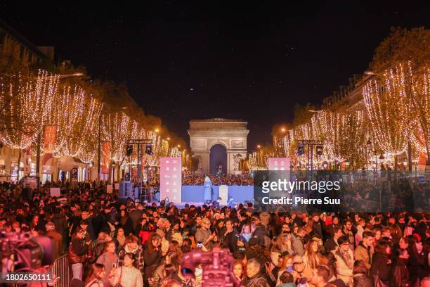 View of atmosphere at the Christmas lights launch at the Champs-Élysées on November 19, 2023 in Paris, France.