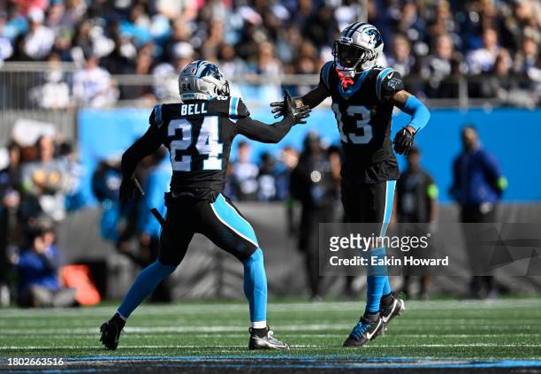 Troy Hill of the Carolina Panthers celebrates after a defensive play with Vonn Bell in the game against the Dallas Cowboys during the second quarter...