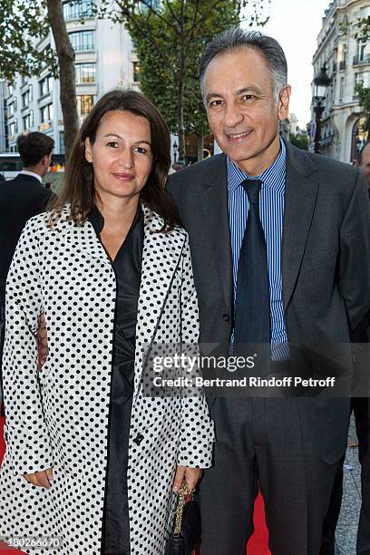 Guillaume Cerutti, CEO Sotheby's France, and his wife Margerie arrive to the premiere of the movie "Quai d'Orsay", organized by the Claude Pompidou...