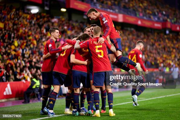 Robin Le Normand of Spain celebrates with his teammates after scoring his team's first goal during the UEFA EURO 2024 European qualifier match...