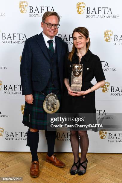 Jon S Baird and Shirley Henderson with the Outstanding Contribution to Film & Television Award during the 2023 BAFTA Scotland Awards held at the...